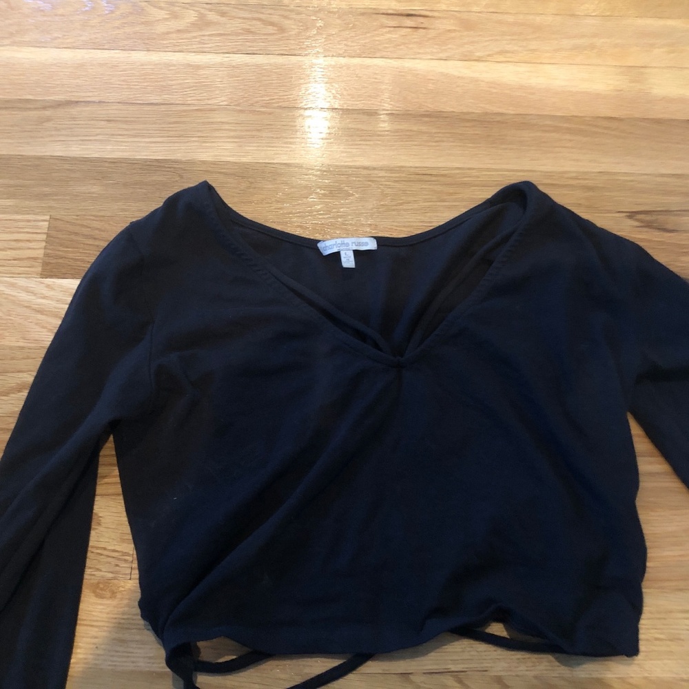 Black crop top with cut outs in the back